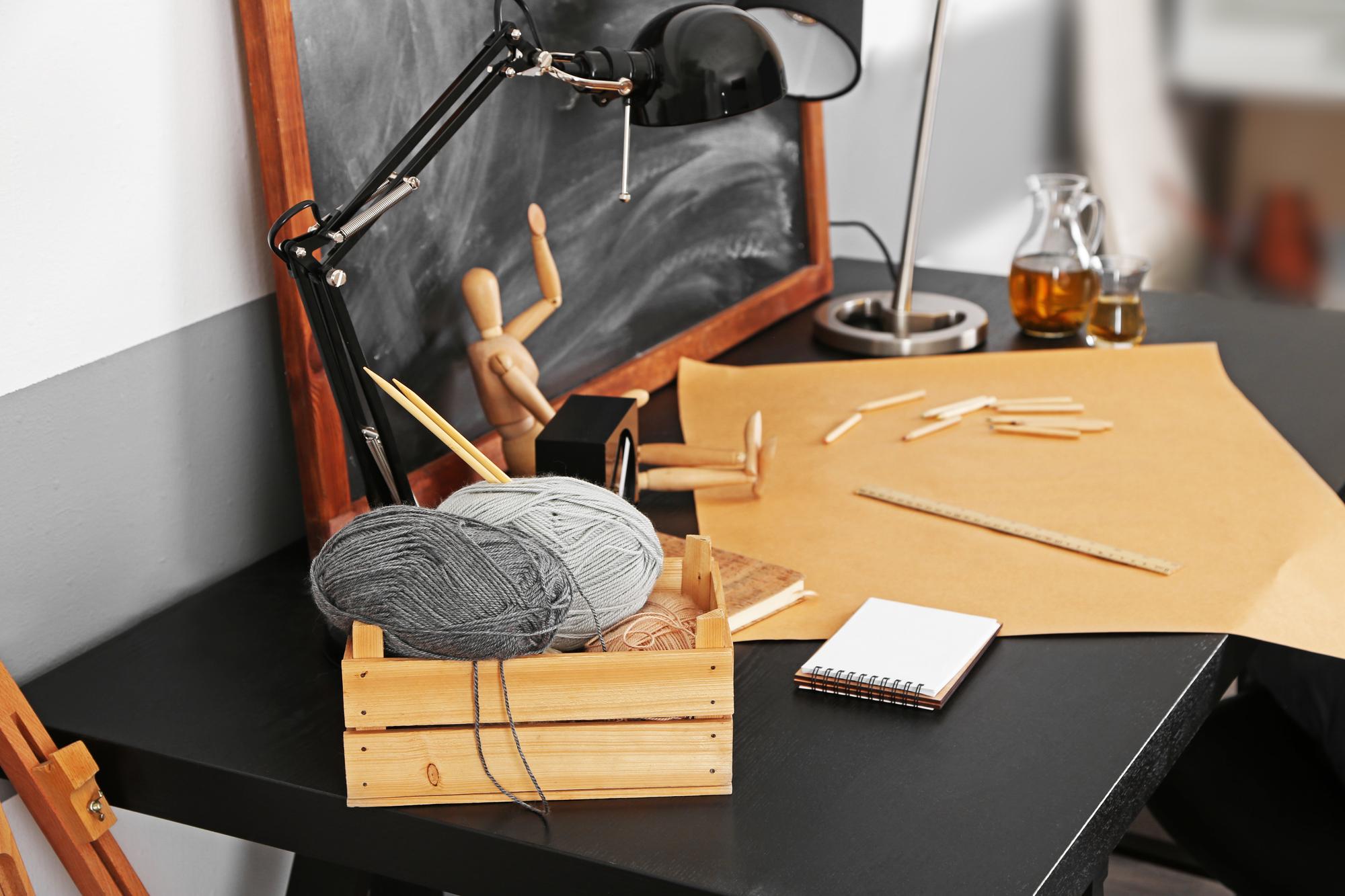 Studio desk with threads and hoop